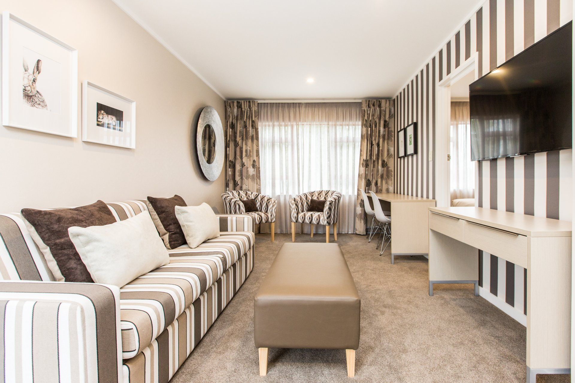 One Bedroom Suite brown lounge