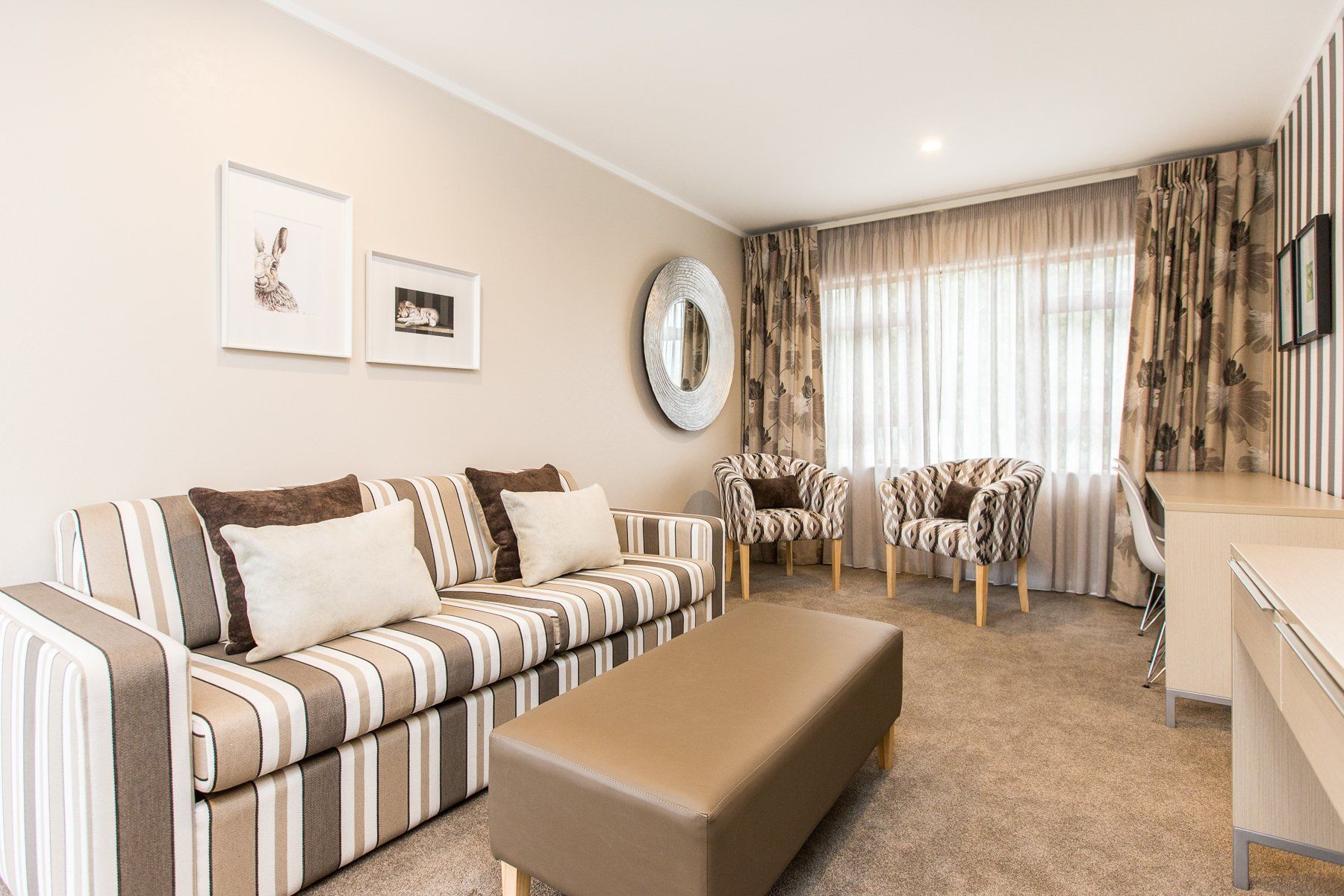 One Bedroom Suite brown lounge
