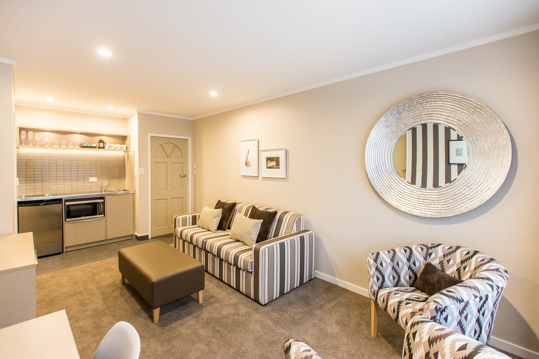 one bedroom suite lounge and kitchen