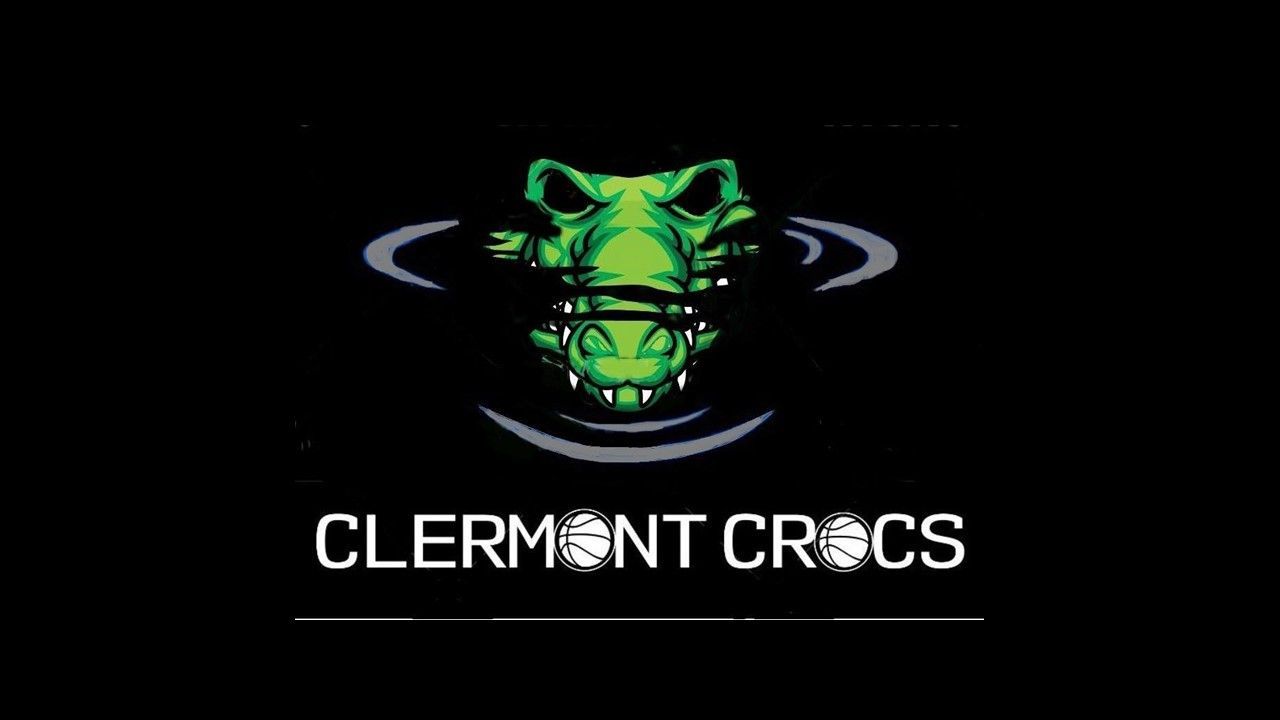 The logo for clermont crocs is a green crocodile head in the water.