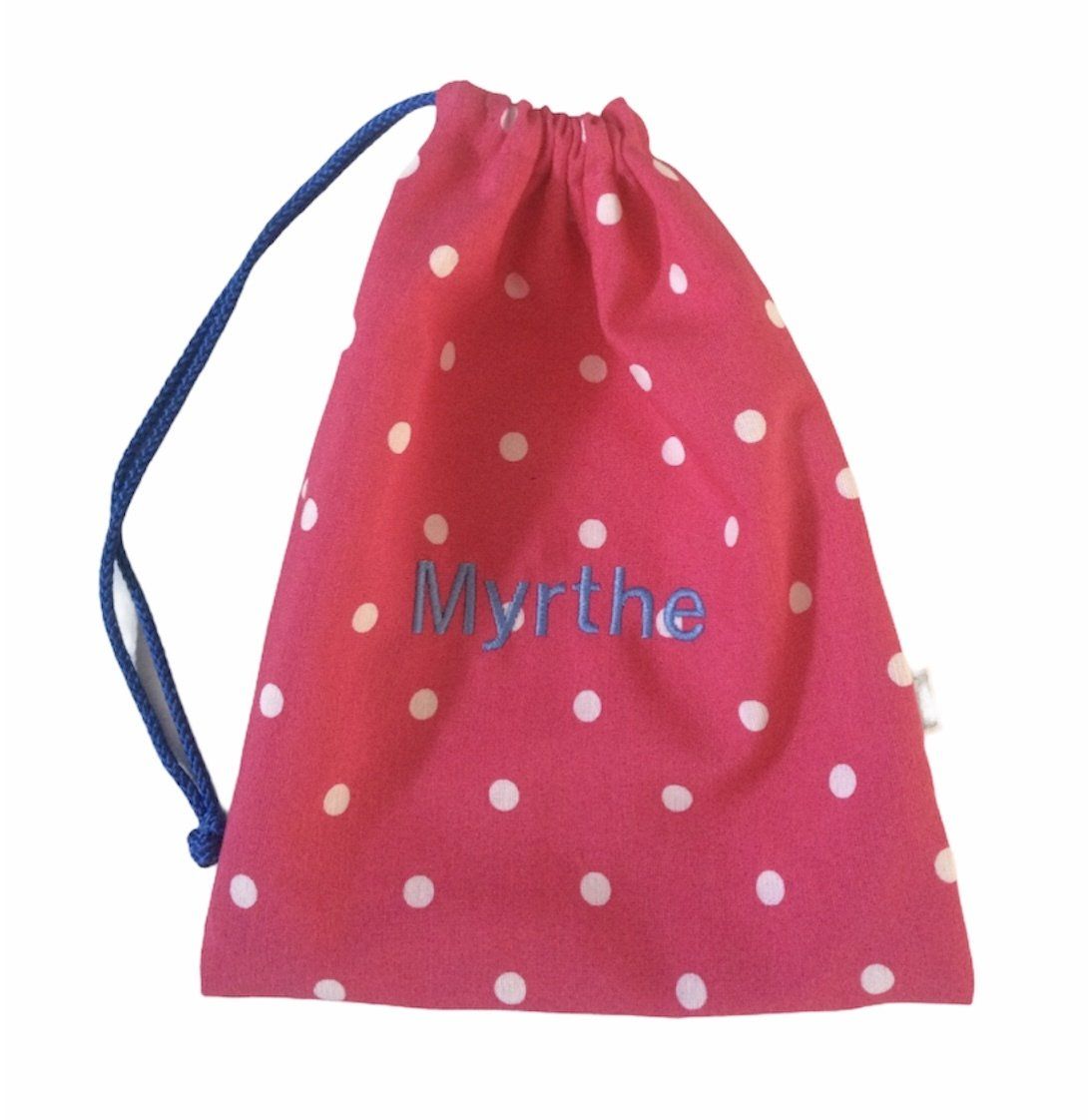 Roze buidel met stippen en trekkoord, met een blauw koord en de naam 