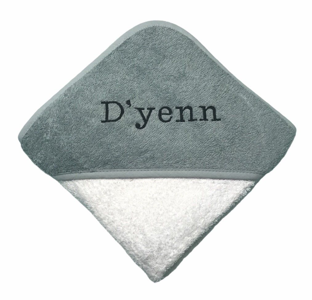 Grijze, ruitvormige D'yenn-tas met een witte onderkant.