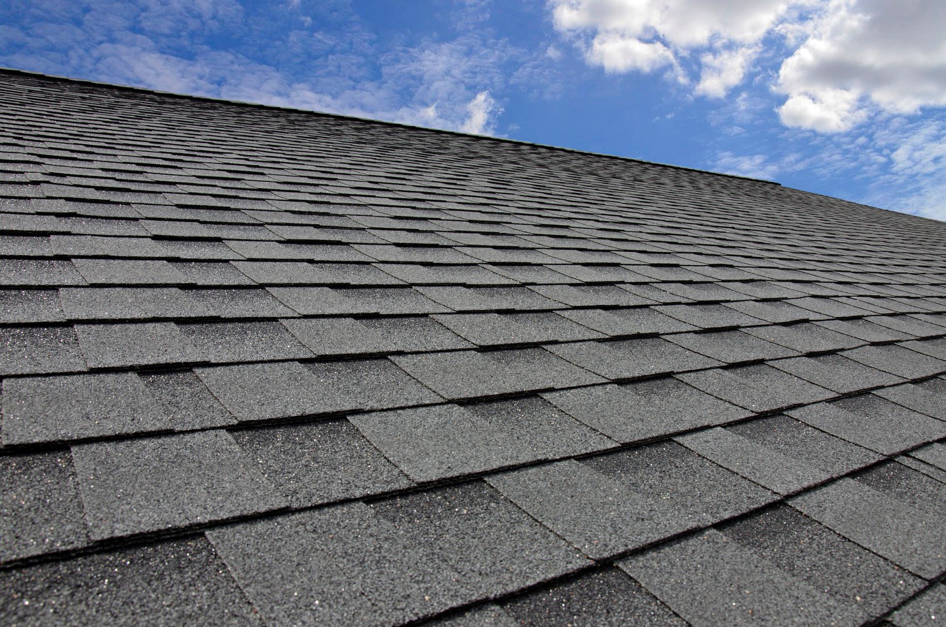 Nice shingle tile against the sky | Davenport, IA - Compass Builders
