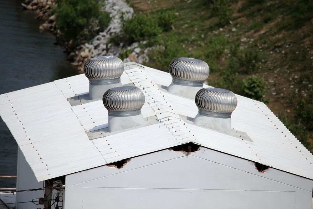 White Roofing with Four Whirlybirds — SRV Roofing in Sunshine Coast, QLD