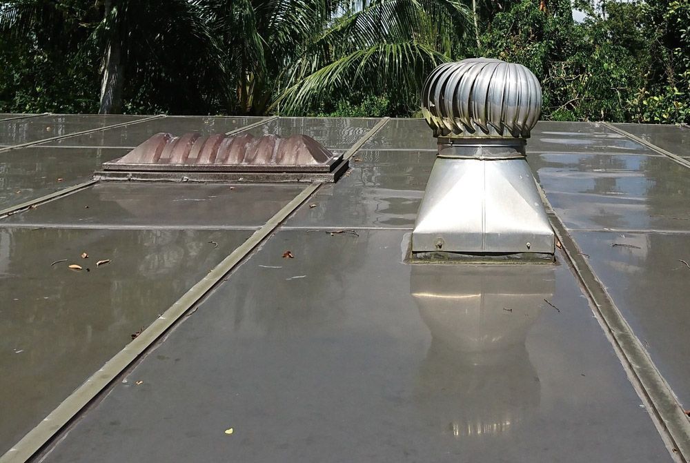 A Roof With a Stainless Steel Fan on Top of It — SRV Roofing in Hervey Bay, QLD