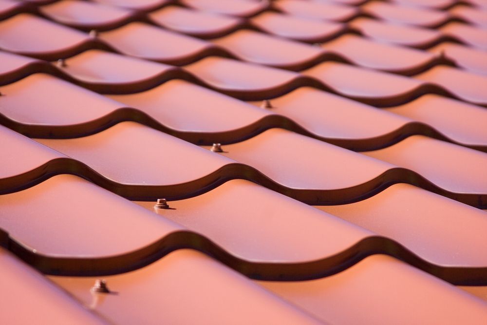A Close Up of a Roof With a Pattern of Waves on It — SRV Roofing in Noosa, QLD
