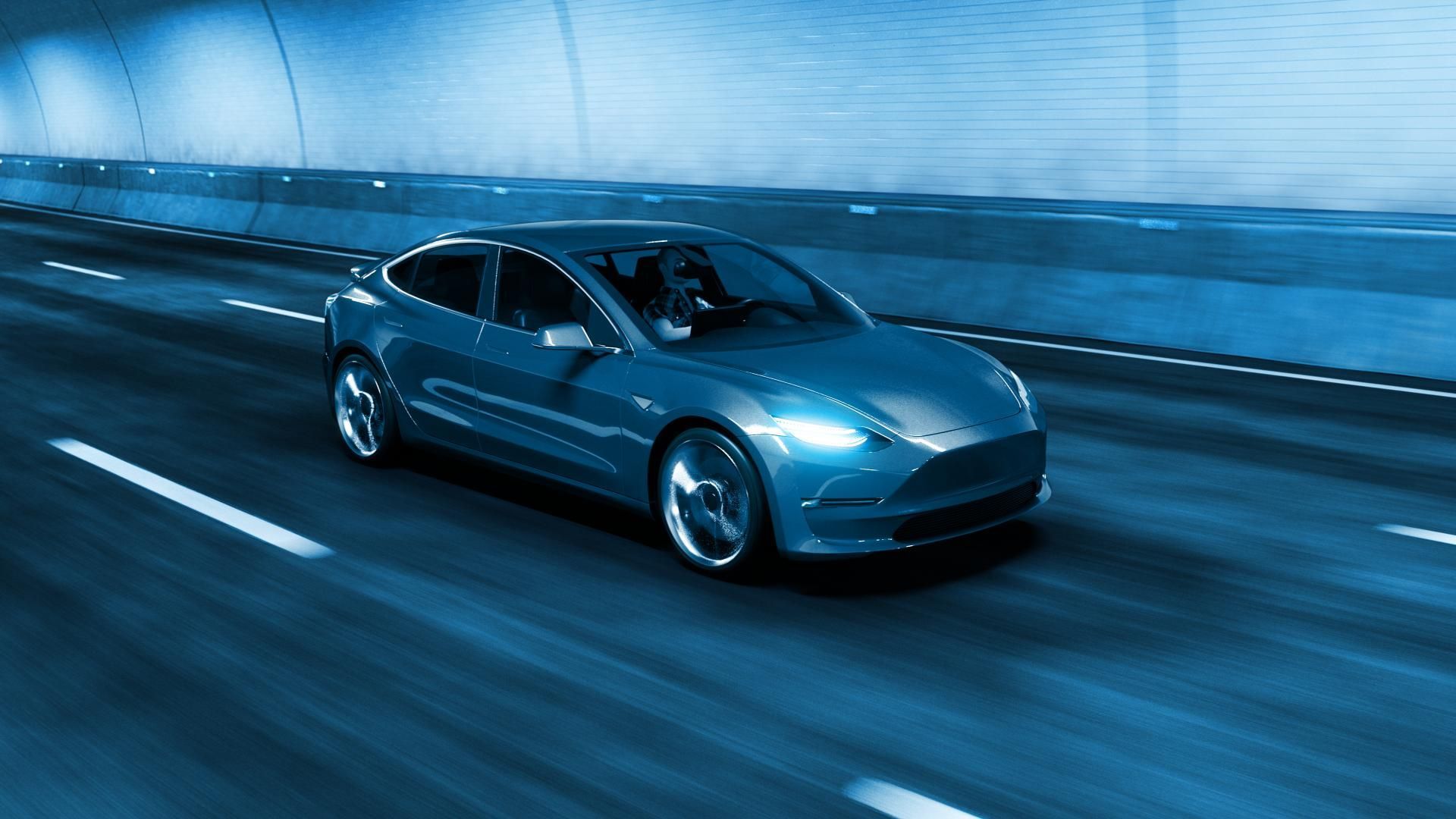 Blue sports car speeding through a tunnel, motion blurred
