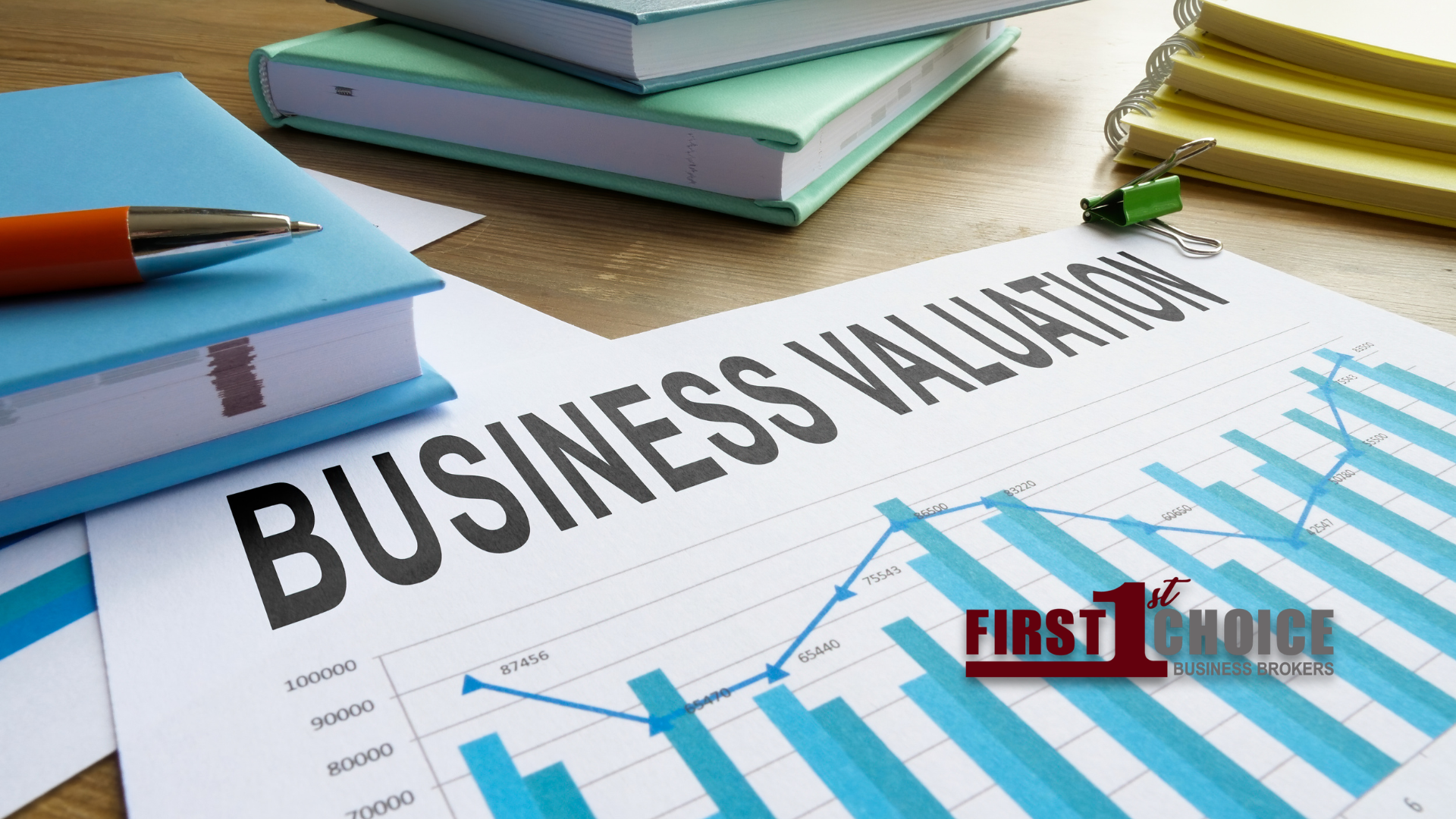 A pen is sitting on top of a piece of paper that says business valuation.