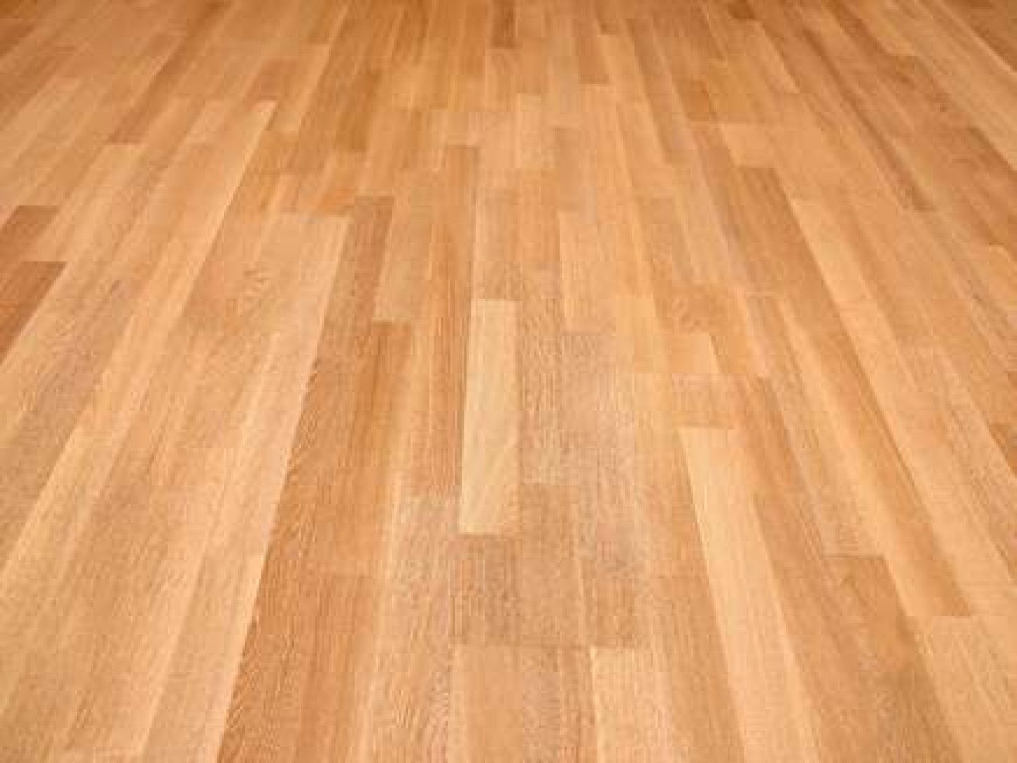 Light brown hardwood floor, planks laid out in a repeating pattern.