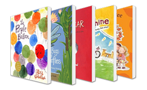 A group of children 's books are lined up in a row.