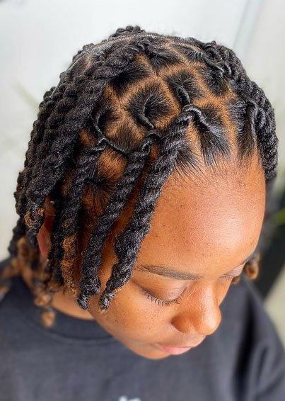 short black dreadlocks styled