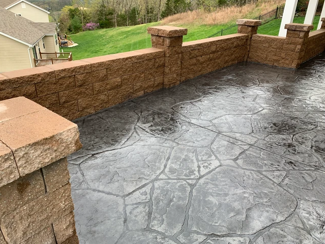stamped patio with seating wall in O'Fallon, MO L&S Concrete