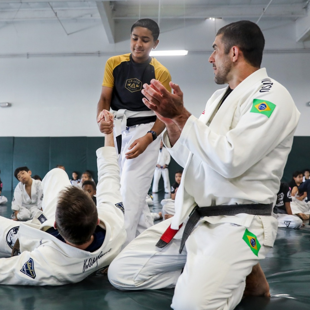 Adults drilling beginner self-defense Jiu-Jitsu techniques at Gracie Jiu-Jitsu San Jose in San Jose, CA for confidence.