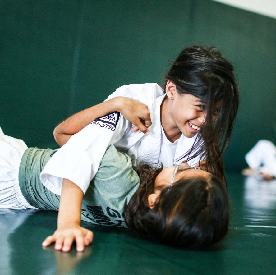 Kids practice safe Jiu-Jitsu drills at Gracie Jiu-Jitsu San Jose in San Jose, CA to build confidence.
