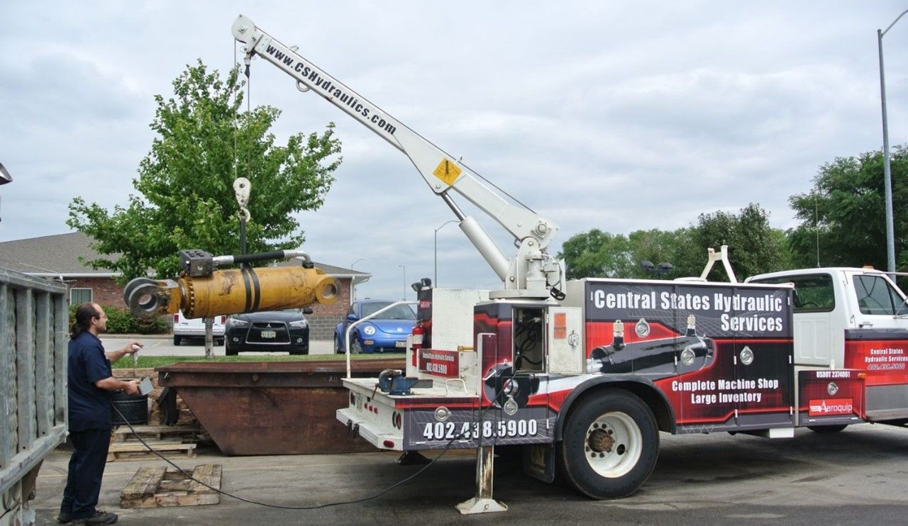 Man Standing Next To A Truck — Lincoln, NE — Central States Hydraulic Services