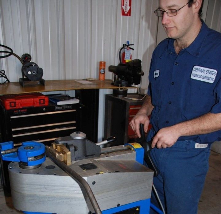 Man In A Blue Shirt With The Word Central On It — Lincoln, NE — Central States Hydraulic Services