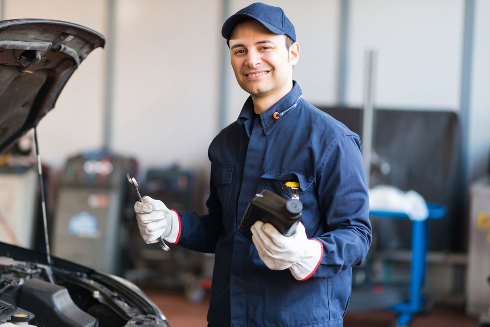 Men Holding Spanner and Equipment for Safety Inspection — A1 Safety Certificates & Repairs in Gordonvale, QLD