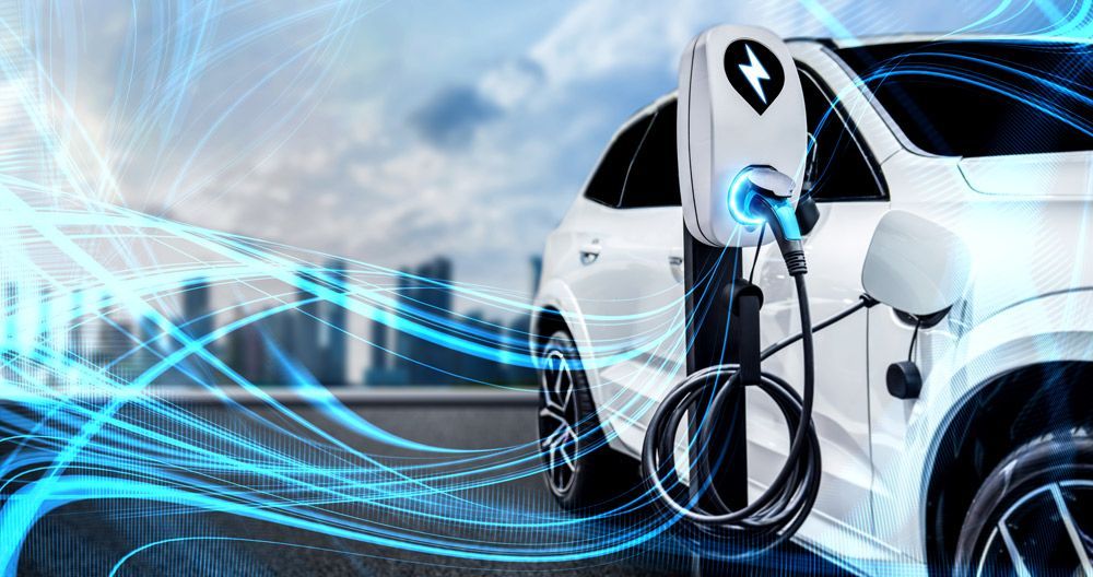 An Electric Car Is Being Charged at A Charging Station — Ryde Energy in Ipswich, QLD