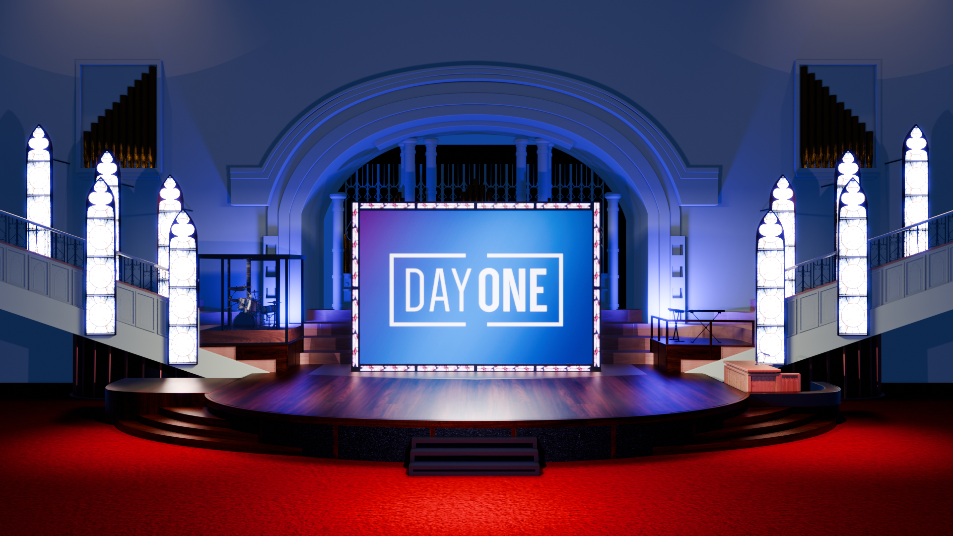 A stage with a large screen that says day one on it.