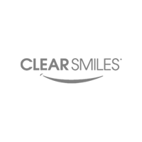 The clear smiles logo is a black and white image of a smiling face.
