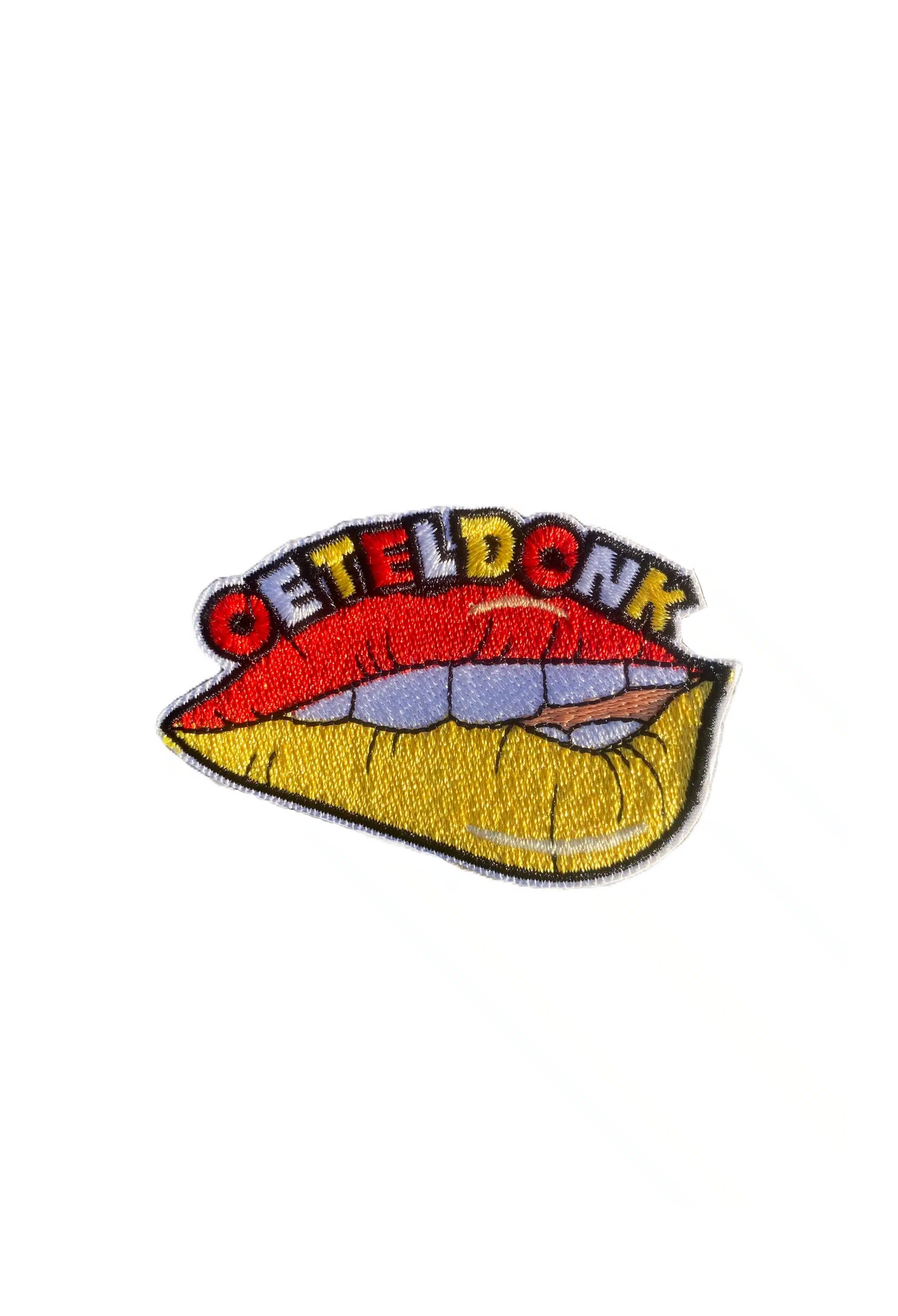 Embleem Oeteldonkse bijtende lippen