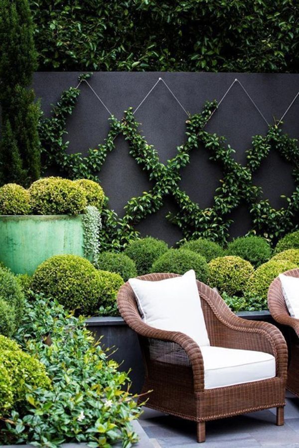 outdoor patio furniture in front of garden