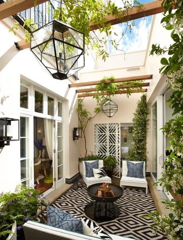 Small outdoor living area with hanging lights