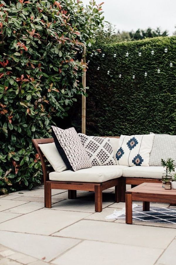 how to refresh your spring patio - outdoor seating and hanging lights