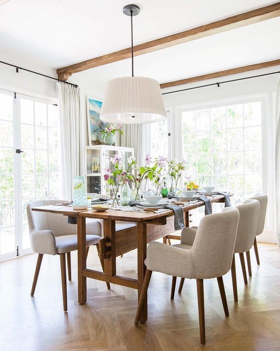 Dining room with proportional light fixture