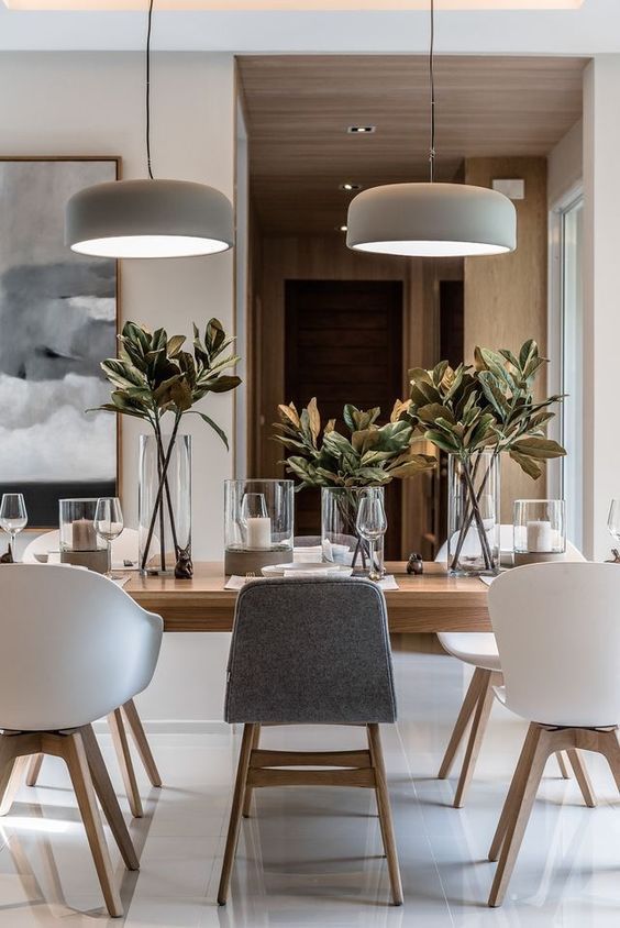 Modern charcoal lighting hanging over dining table