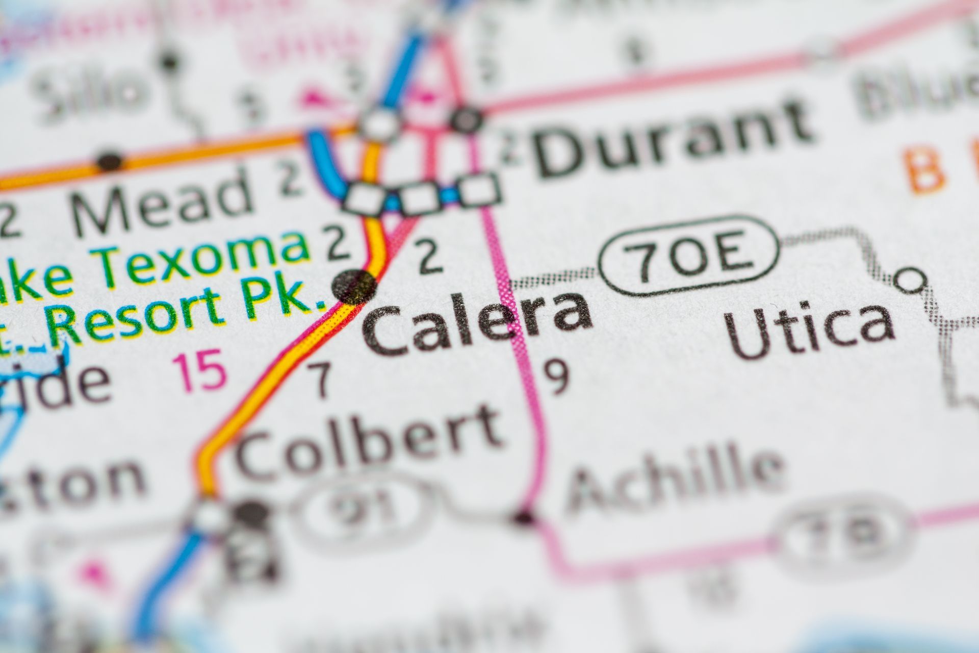A close up of a map showing calera, oklahoma