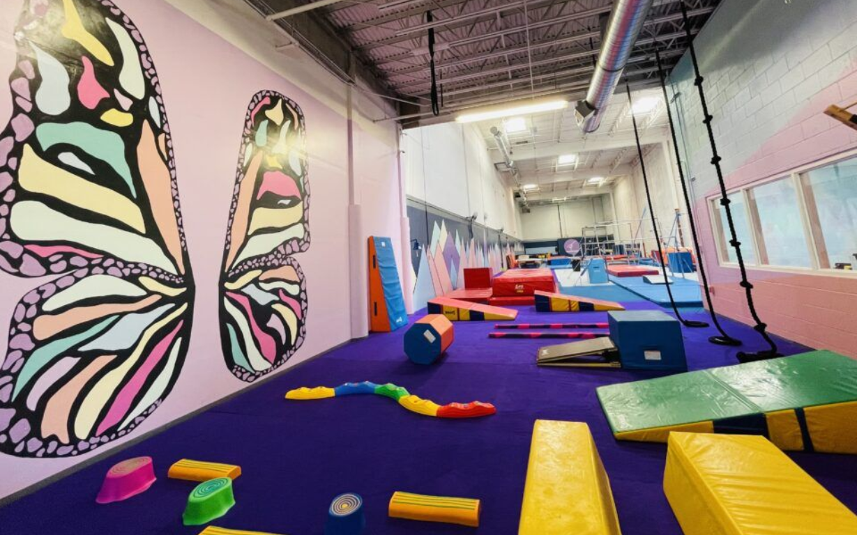 Balance Gymnastics preschool area with butterfly wall