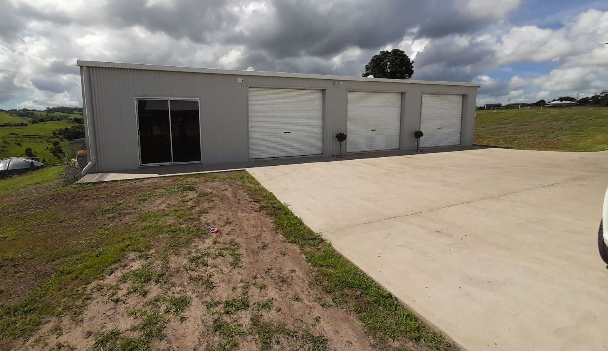 Spacious Three-Door Grey Shed — Shed Kits in Alstonville, NSW