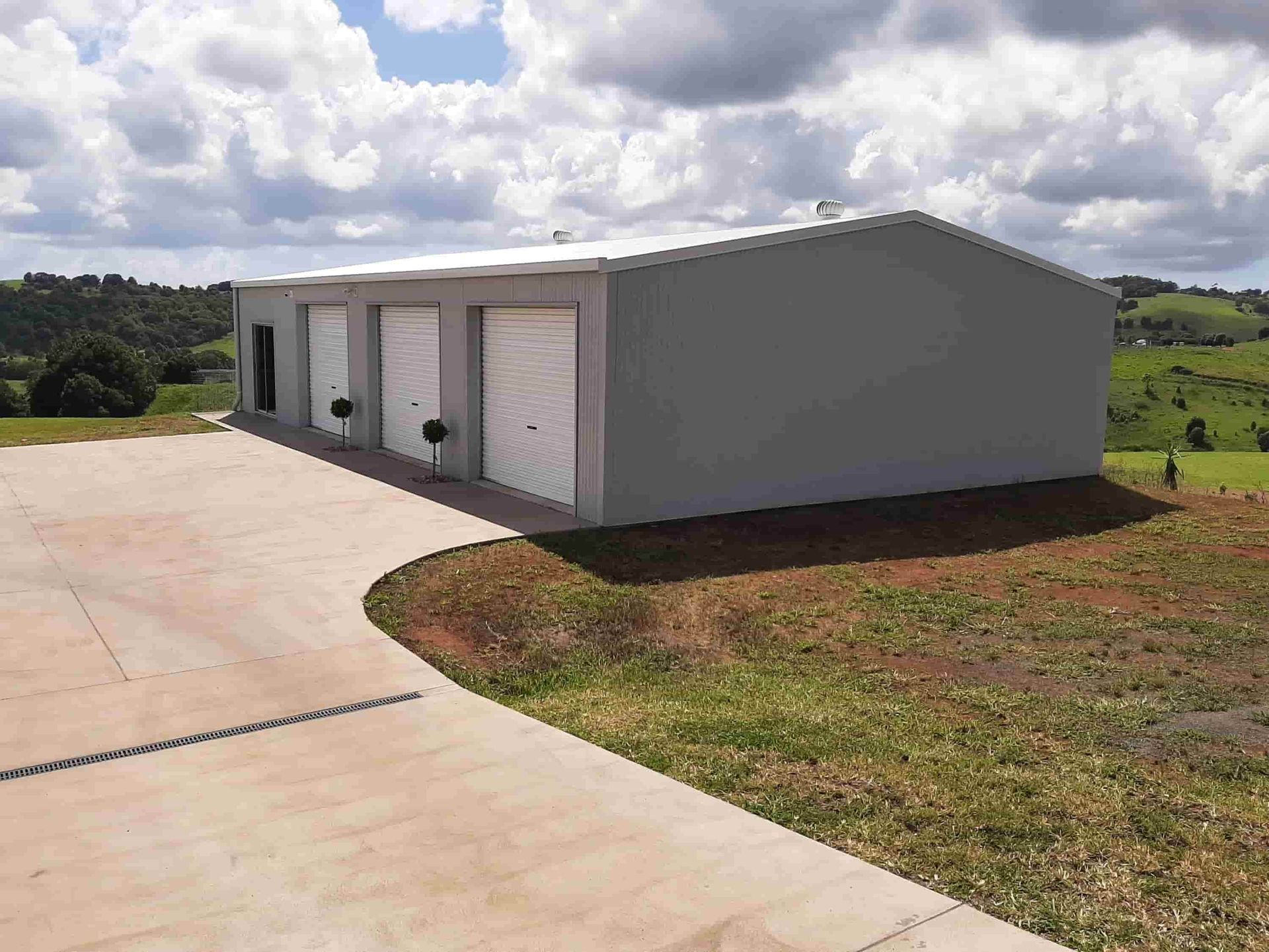 High-Quality Three-Door Steel Garage Kit for Your Needs — Shed Kits in Lismore, NSW
