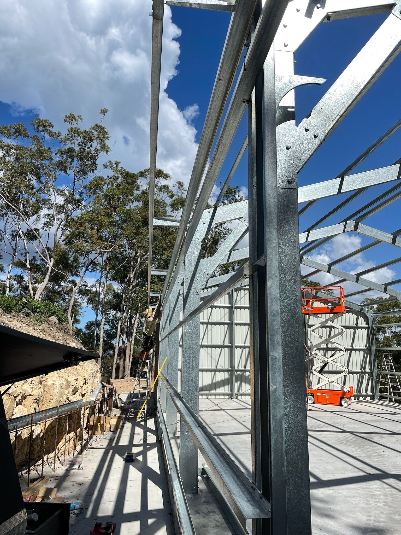Side View Of Metal Shed Under Construction— Shed Kits in Lismore, NSW