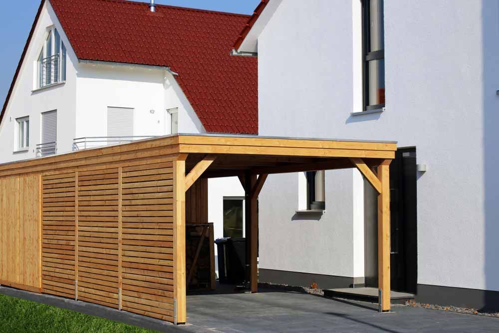 Wooden Shed Next To A Residential House