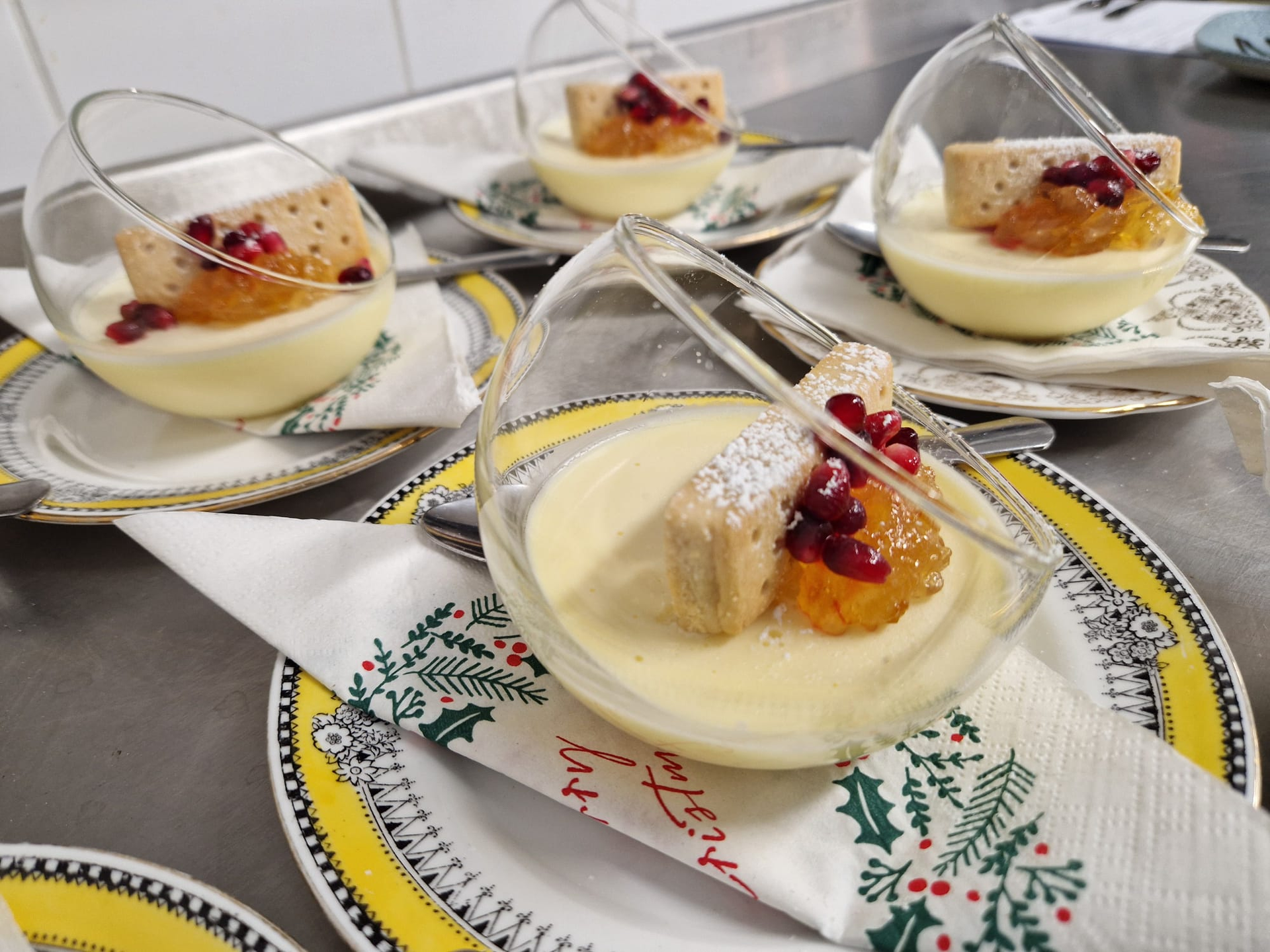Clementine posset served with shortbread and seasonal fruit, showcasing how fresh, in‑season ingredients elevate workplace dining through thoughtful seasonal menu planning.