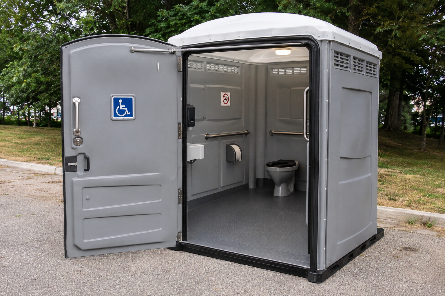 Open accessible portable restroom with gray exterior and wheelchair symbol