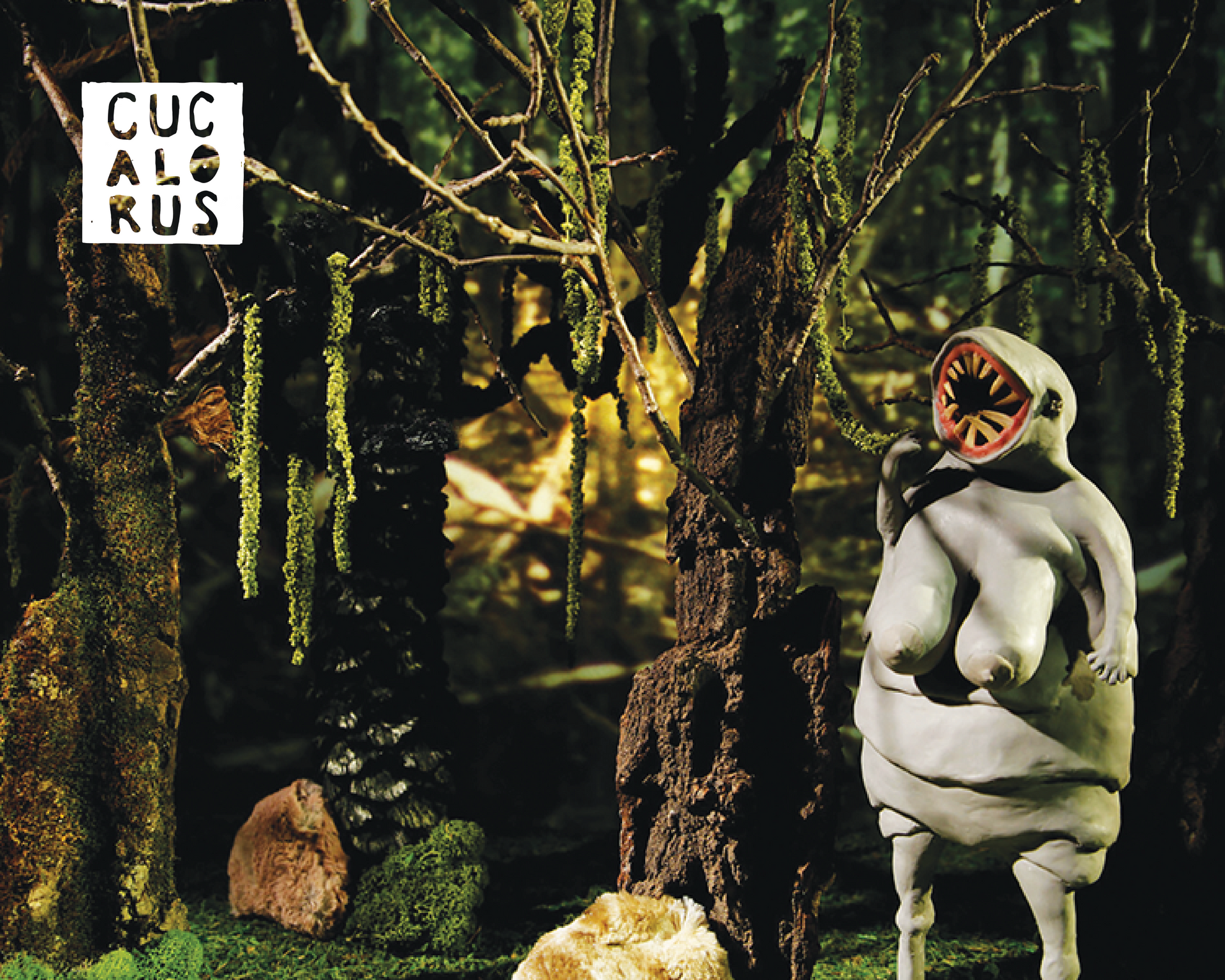 Distorted white figure in a dark forest, with hanging vines and a stylized logo in the corner.