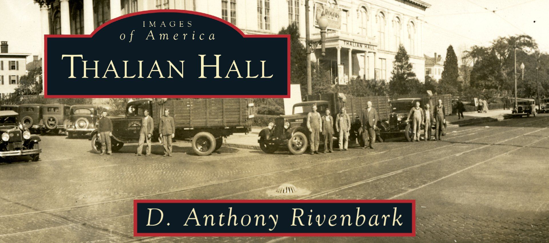 Sepia street scene with vintage cars and a building labeled “Thalian Hall” and “D. Anthony Rivenbark”