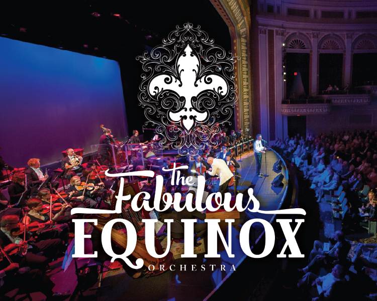 The Fabulous Equinox Orchestra performing on a concert stage with a seated audience