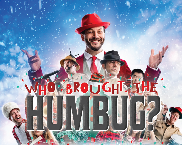 Poster reading “Who Brought the Humbug?” with a smiling man in a red hat and smaller festive characters below