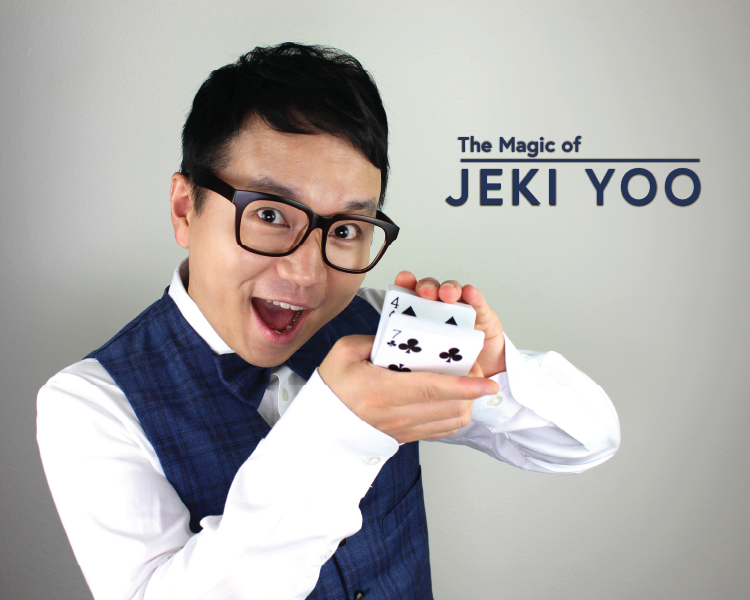 Smiling magician holding playing cards beside the text “The Magic of JEKI YOO”