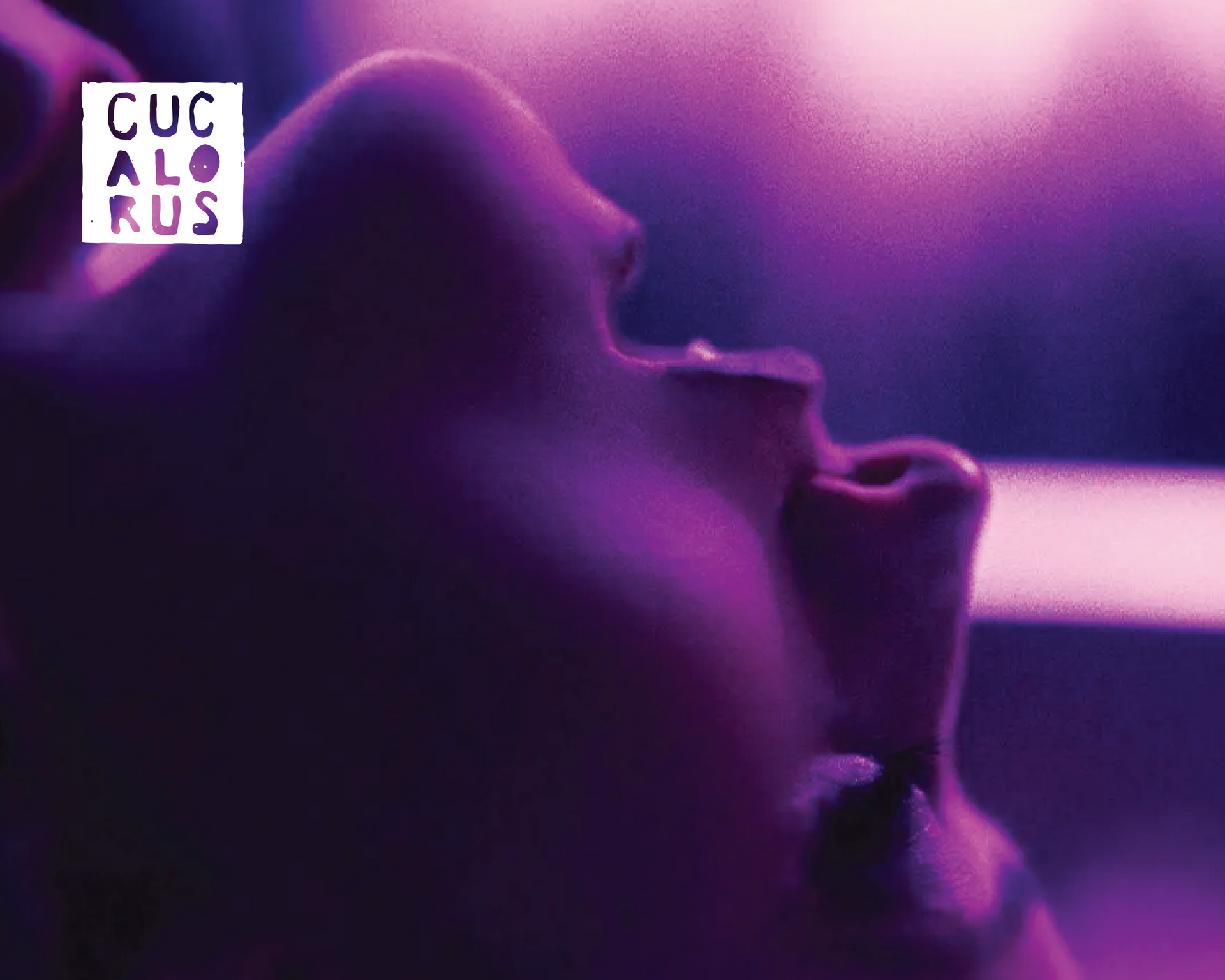 Purple-lit close-up profile of a person with mouth open, in a blurry, neon-tinted scene