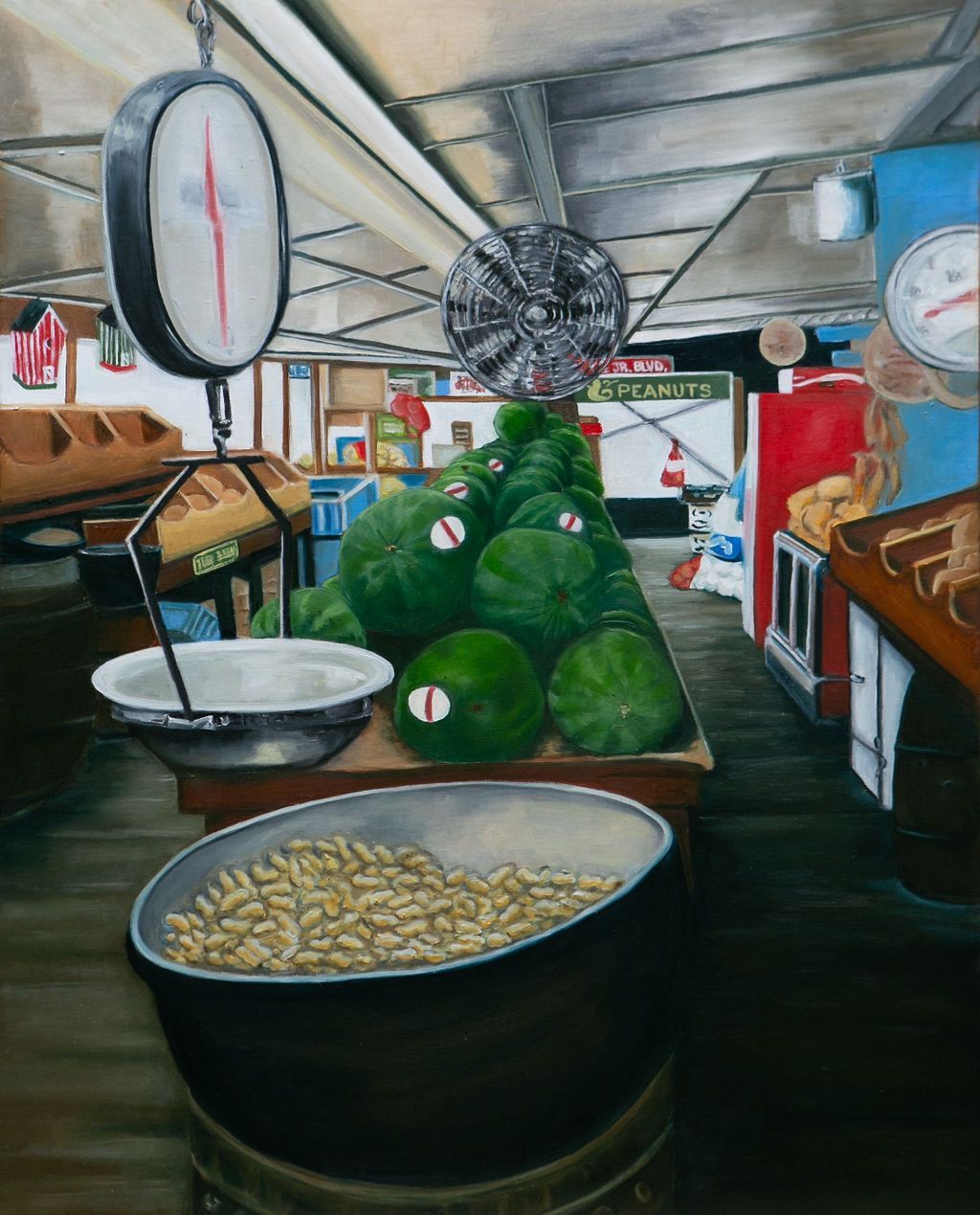 Market stall with green produce piled on a counter and weighing scales overhead