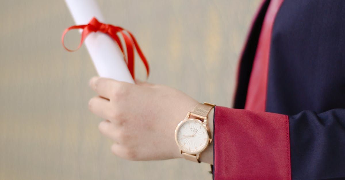 Graduate holding their tertiary degree. Tips for lawyers and legal sector staff in Melbourne, Australia
