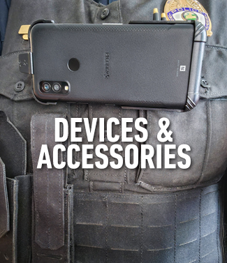 A police officer is wearing a vest with a cell phone attached to it and the words 