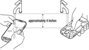 A black and white drawing of a person holding a cell phone.