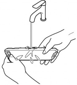 A black and white drawing of a person holding a cell phone.