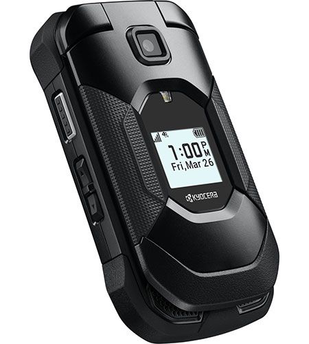 A flip phone with the time of 7:00 on the screen